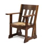 An Athelston oak armchair,