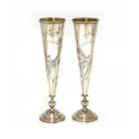 A pair of Russian silver spill vases,