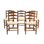 Five Cotswold School 'Clissett'-style oak ladderback chairs,