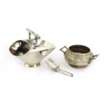 A silver-plated sugar bowl and shovel,