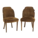 A pair of Art Deco cloud walnut dining chairs,