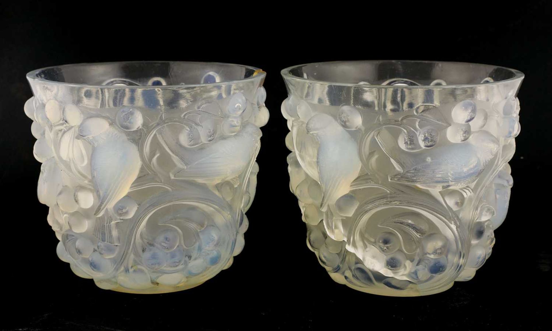 A pair of Lalique opalescent glass 'Avalon' vases,