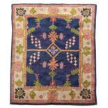 An Arts and Crafts Donegal rug,