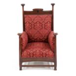 An Arts and Crafts mahogany throne chair,