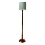 An Art Deco walnut standard lamp,