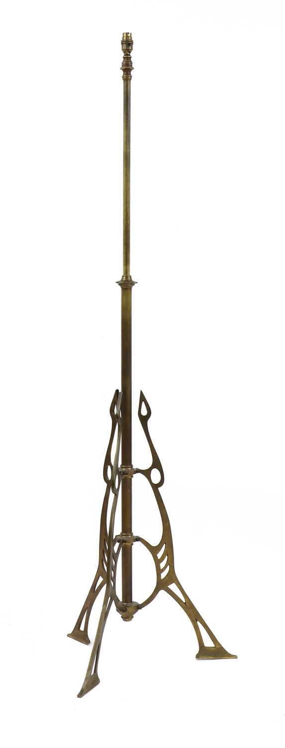 A secessionist brass adjustable standard lamp,