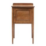 A Cotswold School oak bedside cupboard,