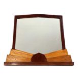 An Art Deco teak and mahogany overmantel mirror,