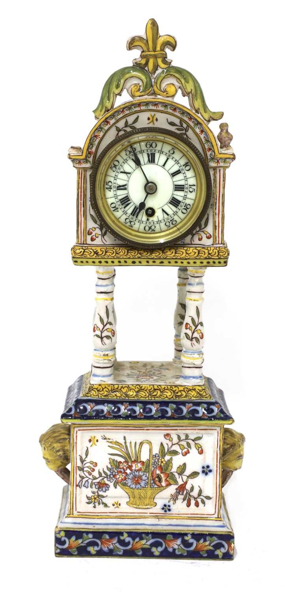 A French faience table clock,