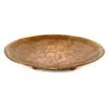 A copper dish,