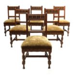 A set of six oak dining chairs,