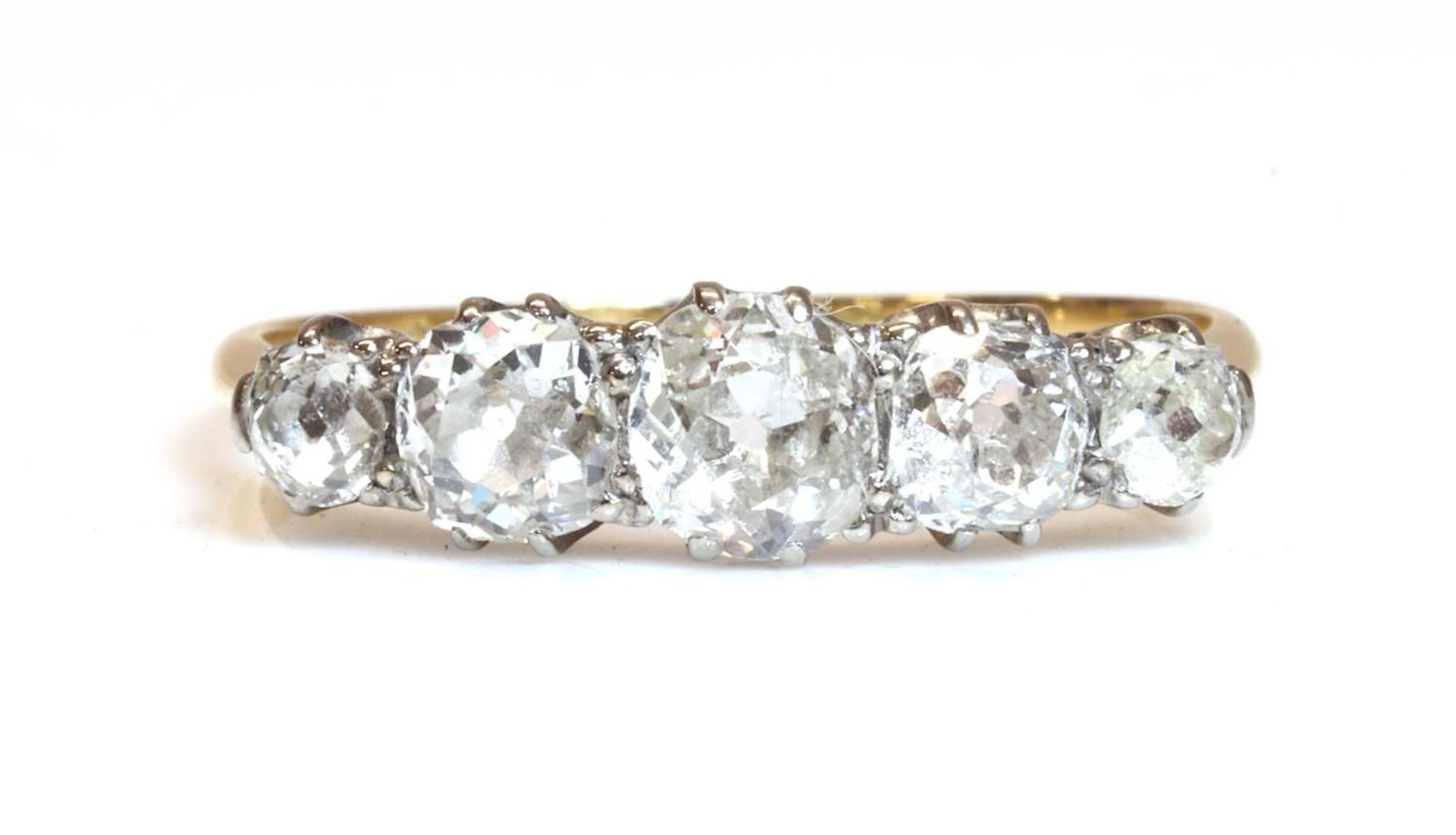 A five stone graduated diamond ring,