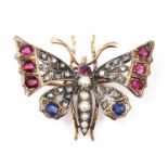 A split pearl ruby, sapphire and diamond butterfly brooch, c.1900,