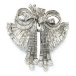 A diamond set double clip waterfall brooch/pendant, c.1945,