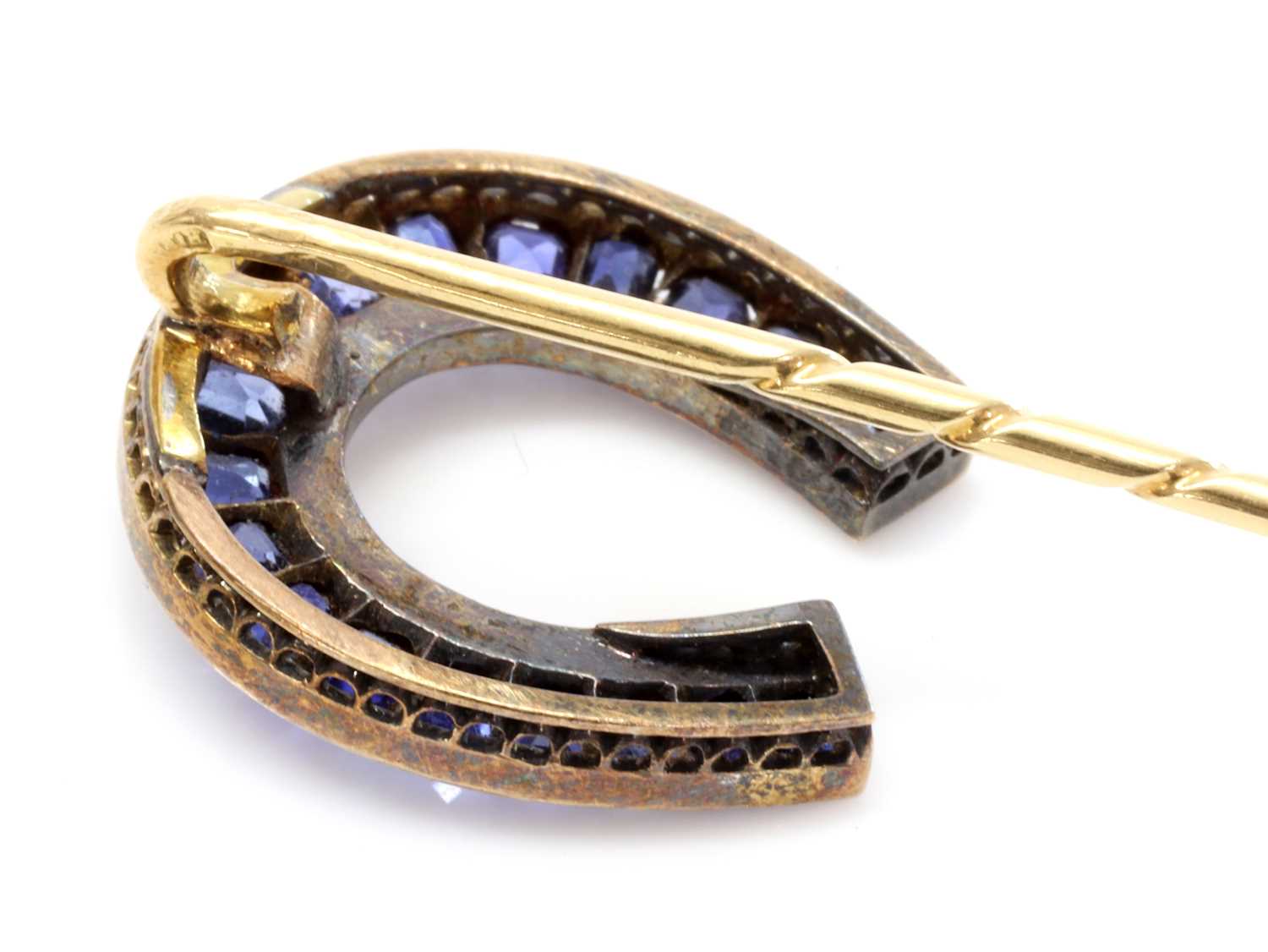 A former Austro-Hungarian sapphire and diamond horseshoe stick pin, attributed to Moritz Henolé, - Image 2 of 4