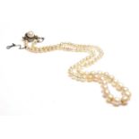 A single row graduated natural saltwater pearl necklace,