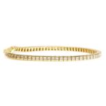 A Continental gold diamond set line bracelet,
