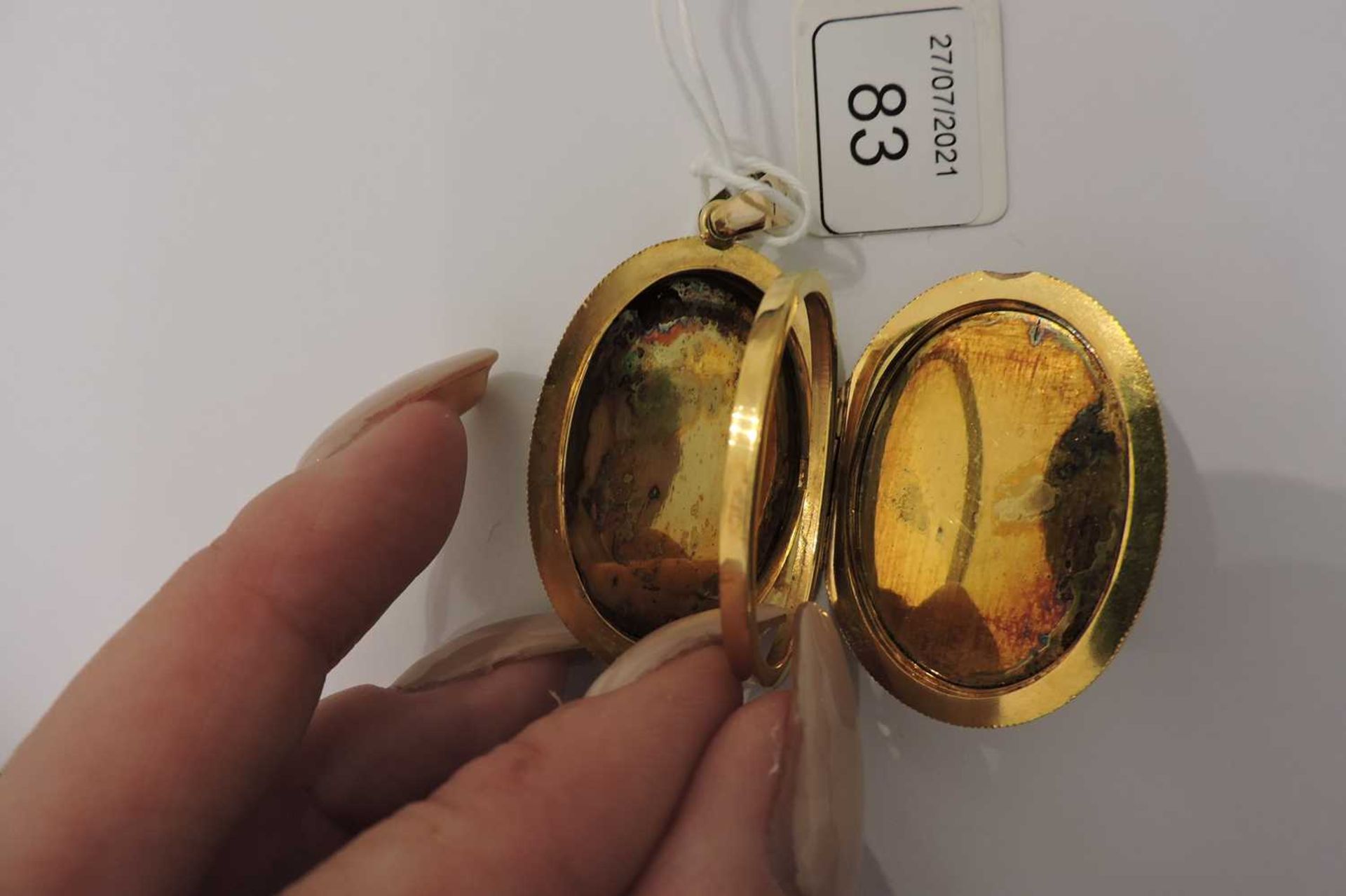 A Shakudo double sided oval hinged locket, c.1880, - Image 4 of 5