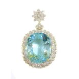 An 18ct gold Paraiba tourmaline and diamond pendant,