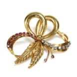 An Italian gold ruby and diamond bow spray brooch, c.1950,