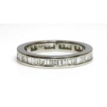 A platinum diamond set full eternity ring,