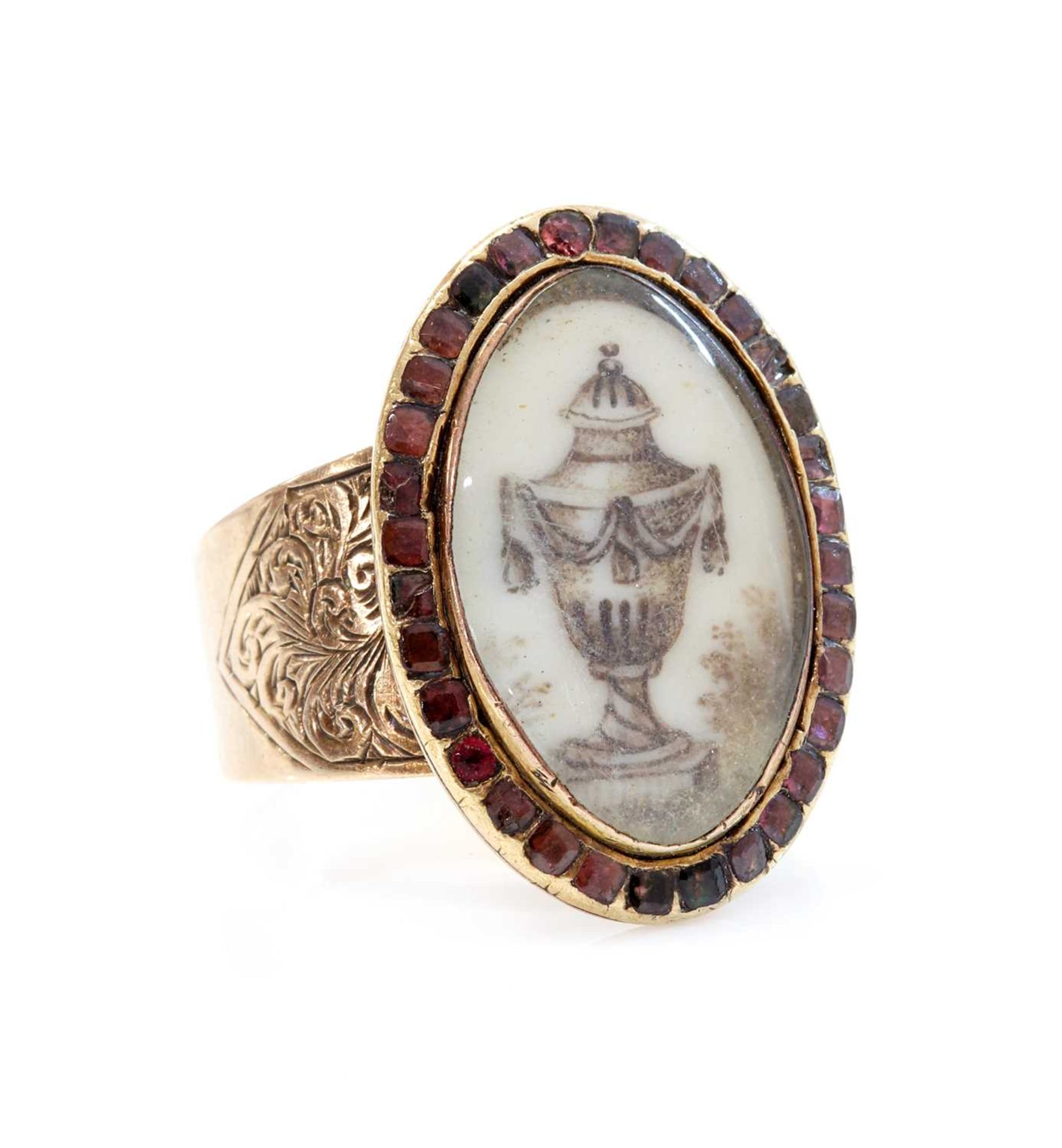 A Georgian garnet set memorial ring,