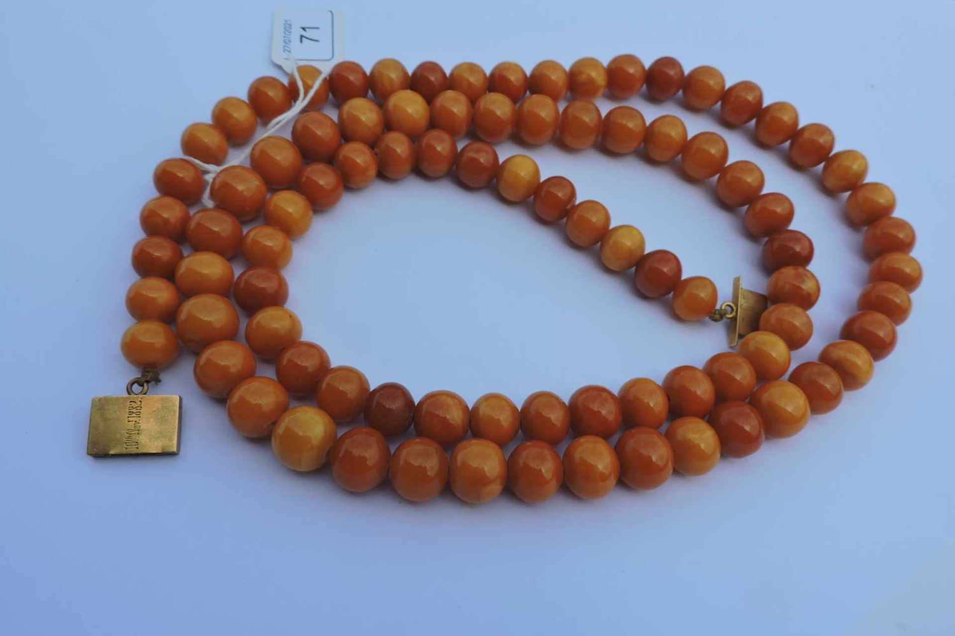 A single row uniform spherical butterscotch amber bead necklace, - Image 5 of 6