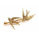 A gold and split pearl swallow brooch, c.1900,