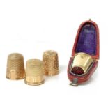A cased Continental gold thimble,