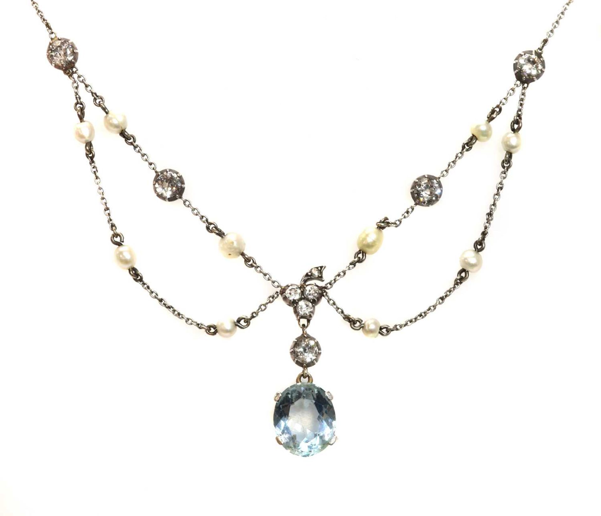 An Edwardian aquamarine, diamond and pearl swag necklace, c.1910,