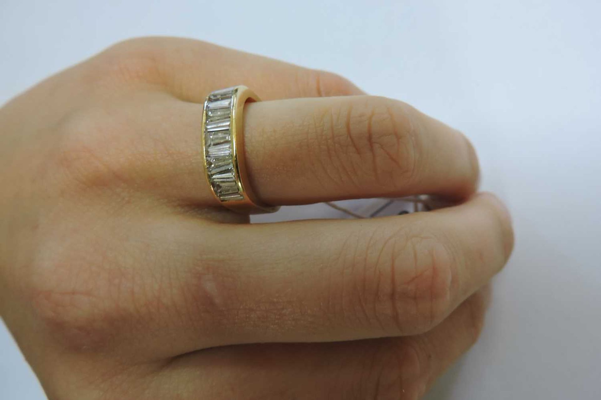 A Continental diamond set half eternity ring, - Image 3 of 3