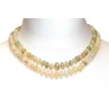 A two row graduated opal bead necklace,