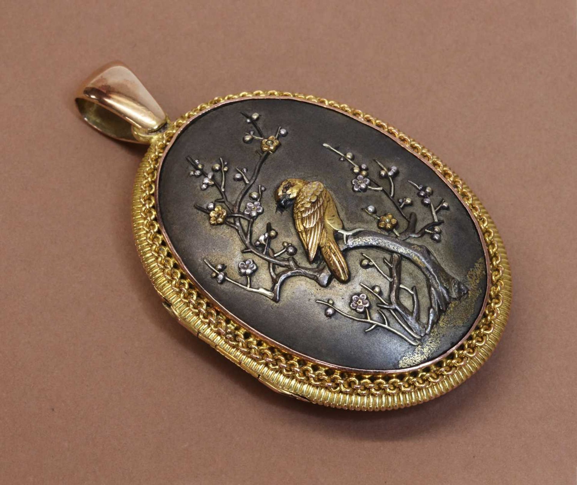 A Shakudo double sided oval hinged locket, c.1880, - Image 3 of 5