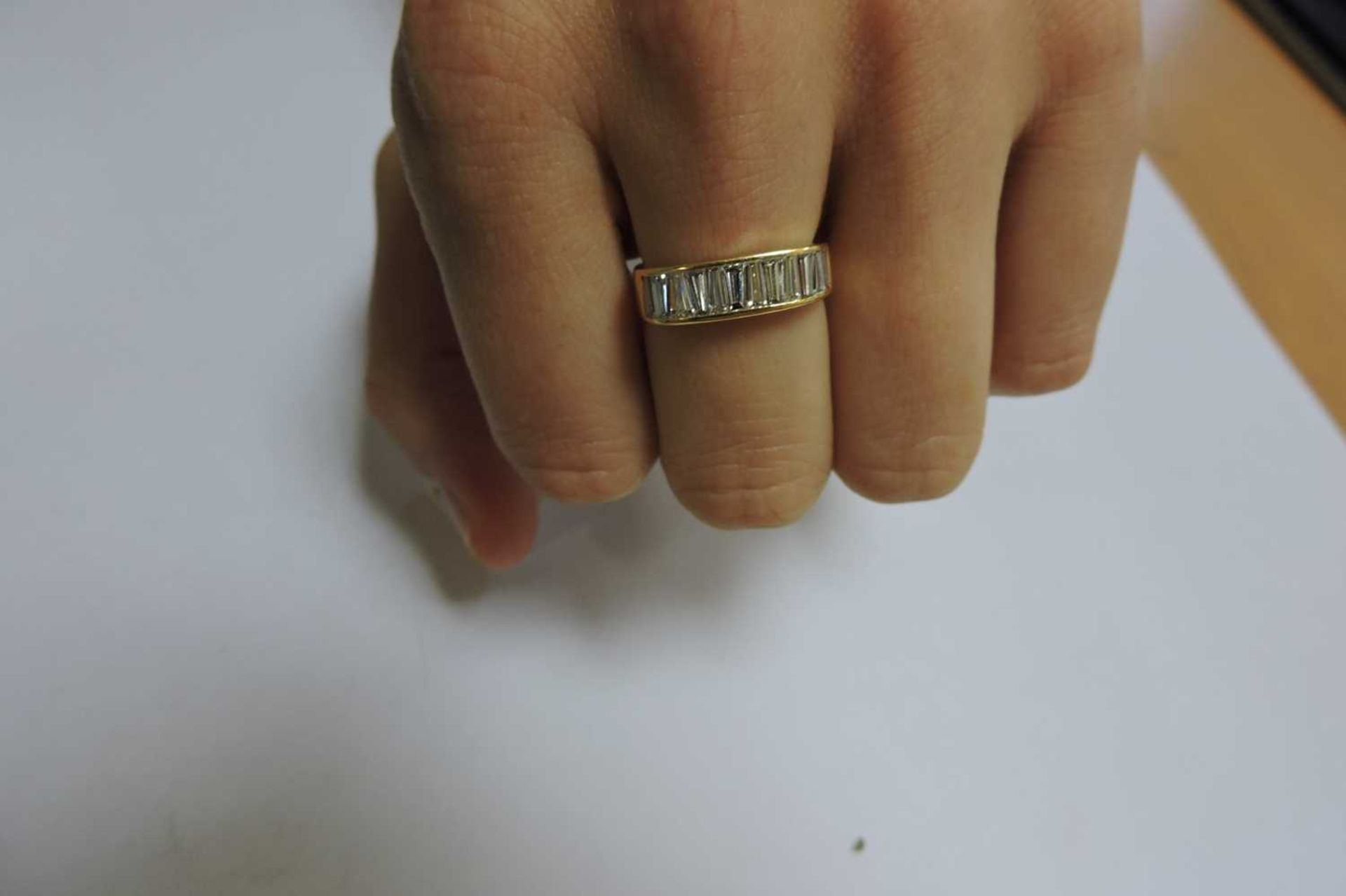 A Continental diamond set half eternity ring, - Image 2 of 3