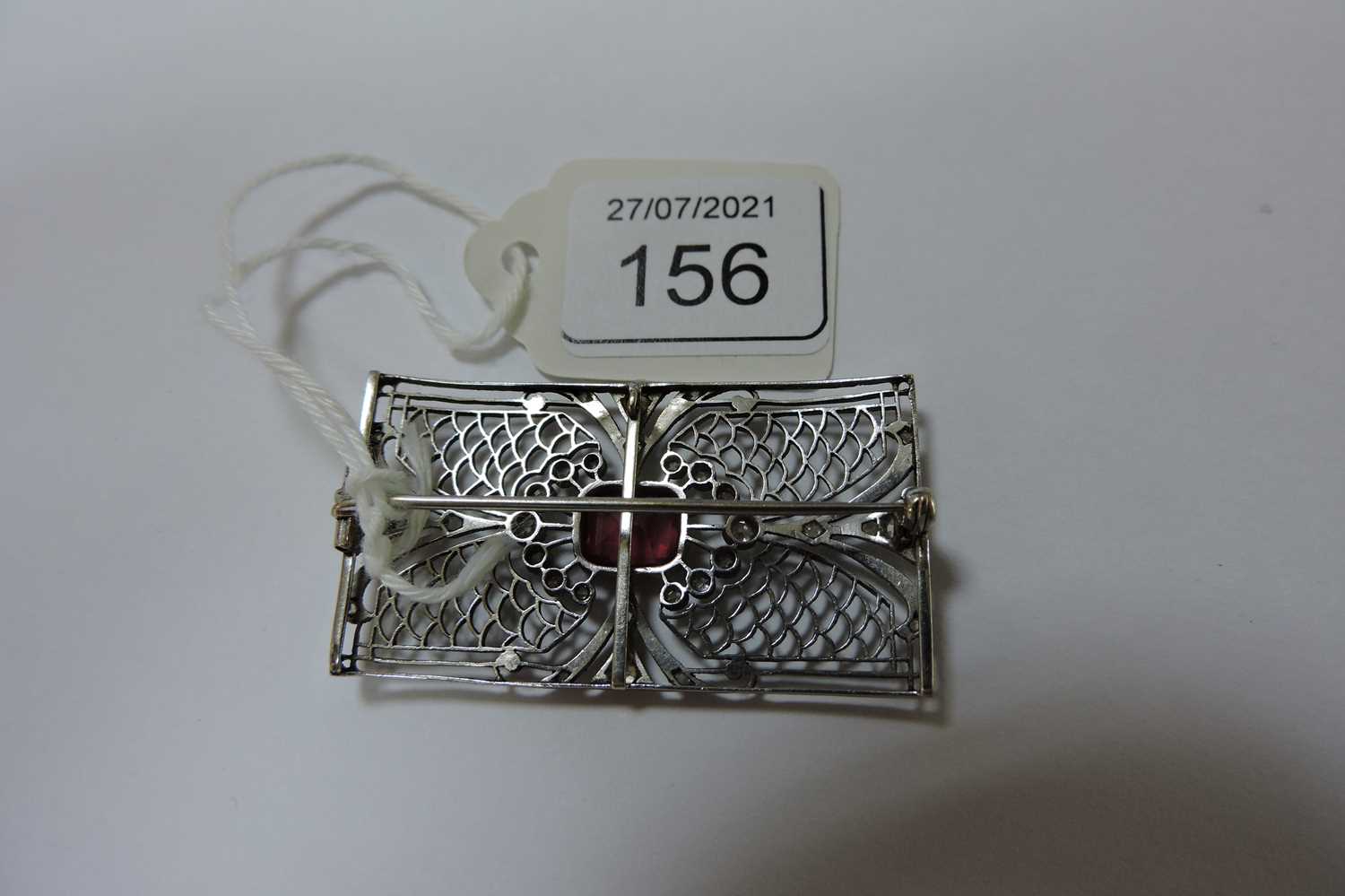 An Art Deco synthetic ruby and diamond rectangular plaque brooch, - Image 4 of 5