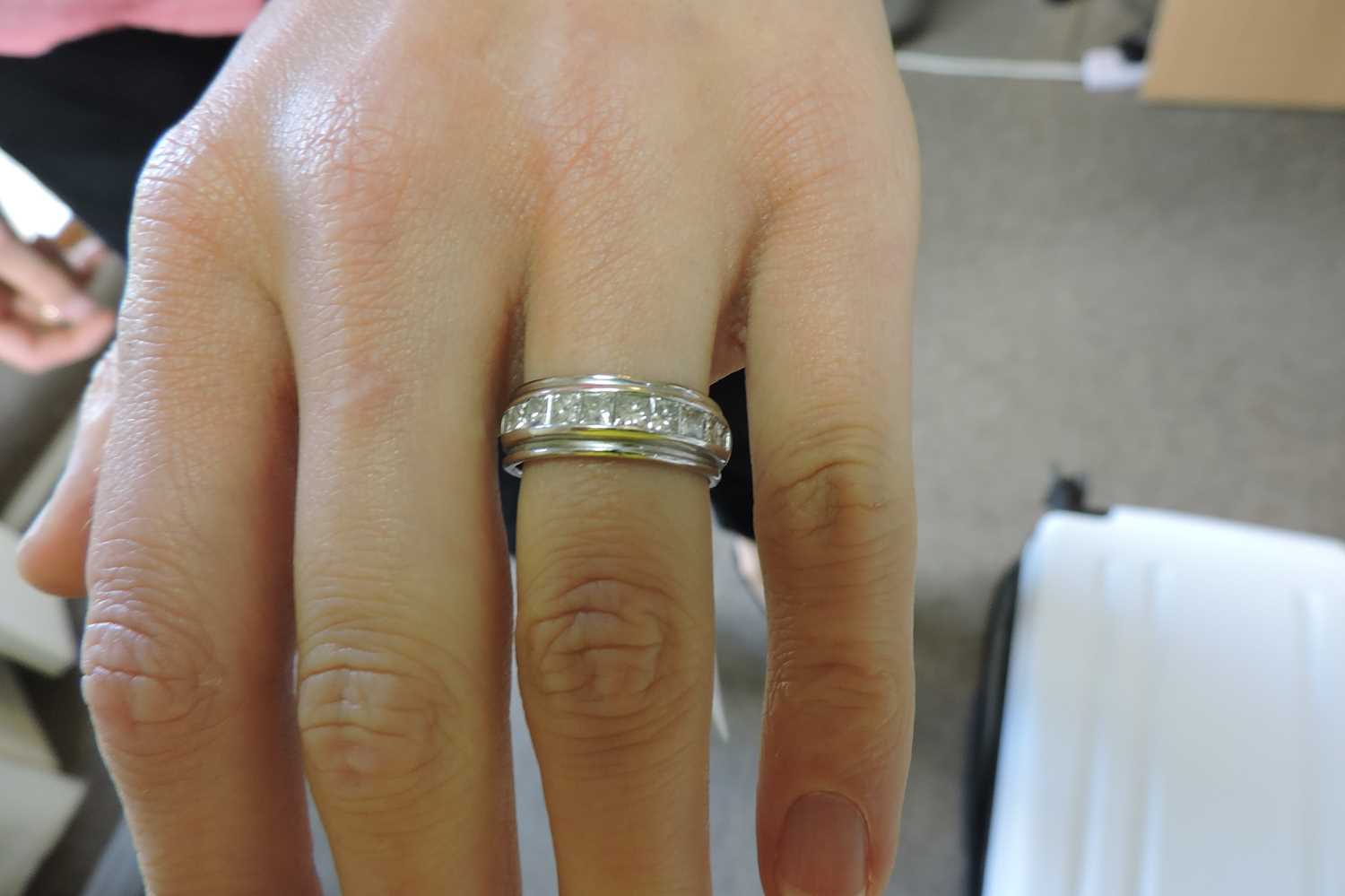 An 18ct white gold diamond half eternity ring, - Image 2 of 3