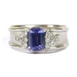 A Continental white gold tanzanite and diamond band ring,