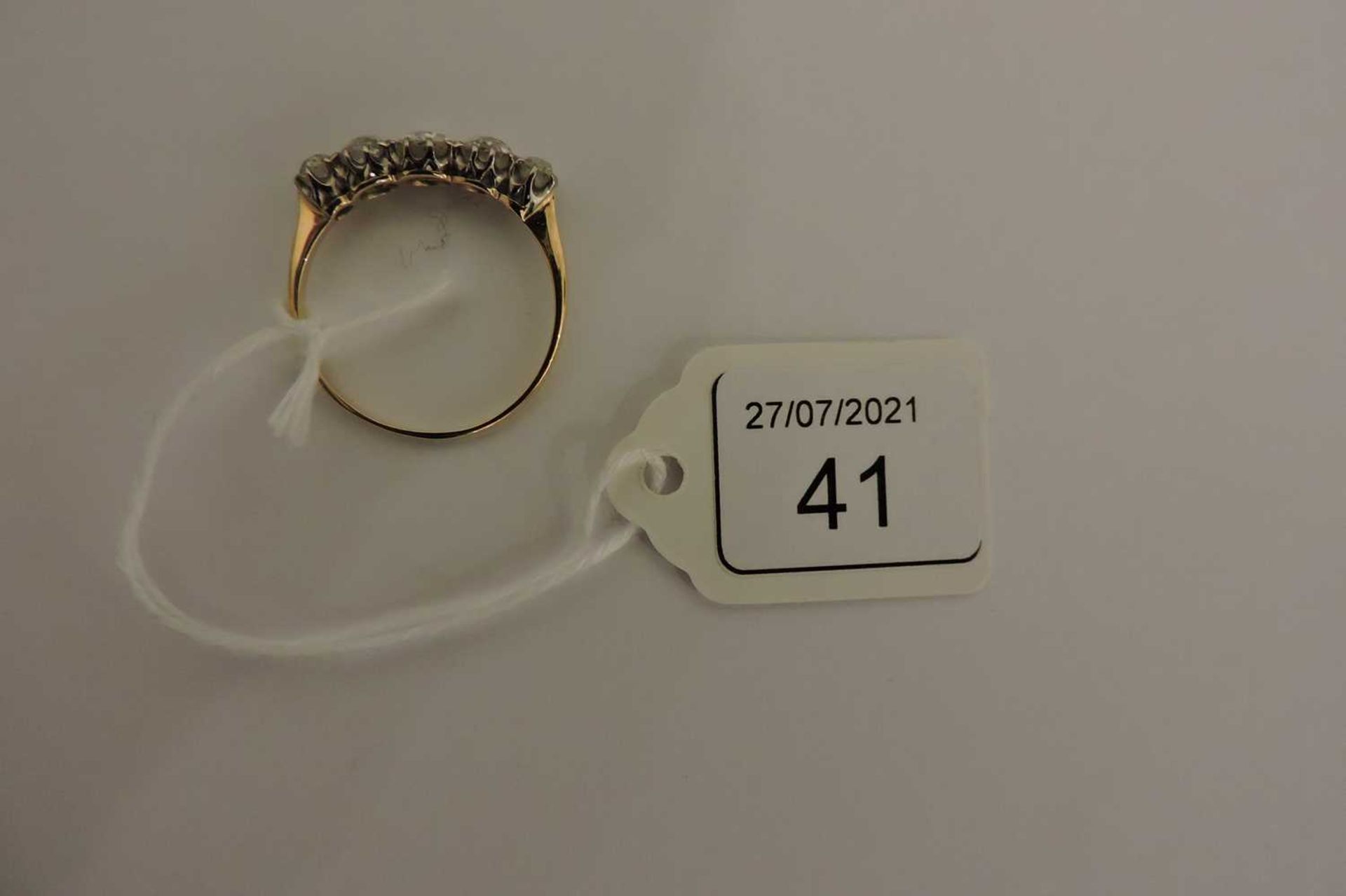 A five stone graduated diamond ring, - Image 3 of 4