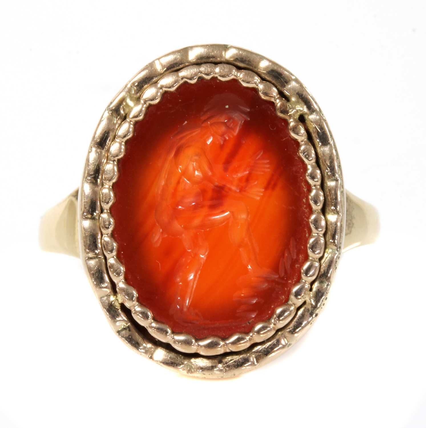 A Georgian gentlemen's cornelian intaglio engraved gold ring,