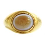 A Roman gentlemen's high carat gold 'eye' agate intaglio ring,