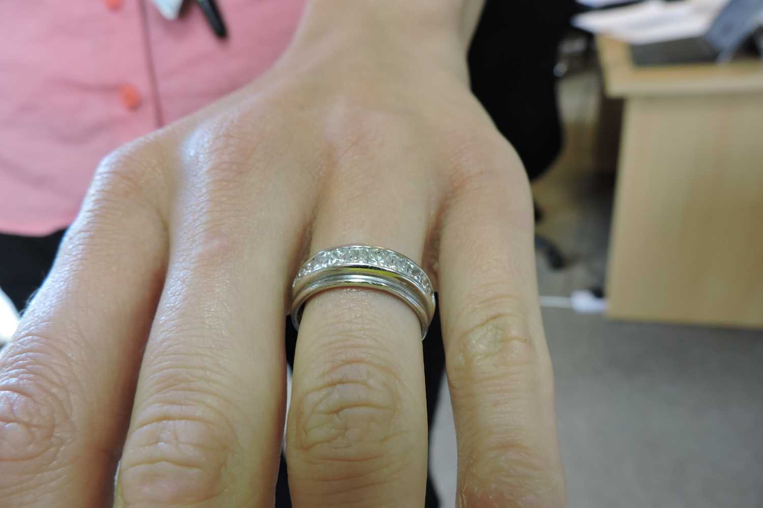 An 18ct white gold diamond half eternity ring, - Image 3 of 3