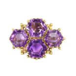 A late Victorian amethyst brooch,