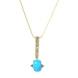 A gold turquoise and diamond pendant and earring suite,