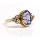 An 18ct gold single stone sapphire ring,