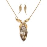 An 18ct two colour gold smoky quartz and diamond necklace and earring suite, c.1990,