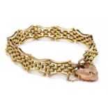 An Edwardian 9ct gold gate bracelet,