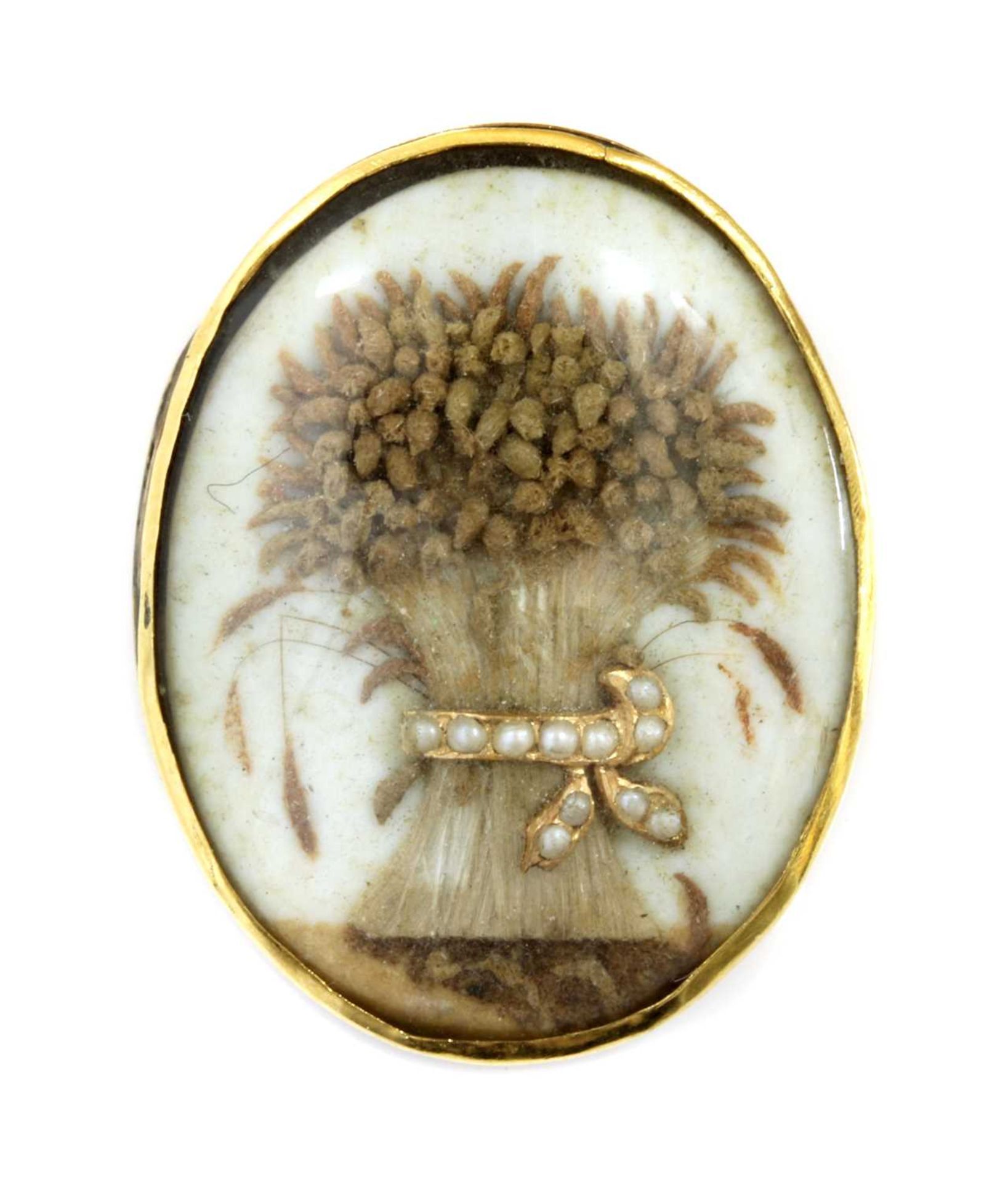 A Georgian split pearl memorial wheatsheaf glazed panel,