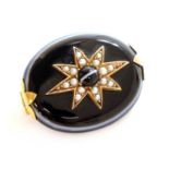 A Victorian bullseye agate and split pearl star brooch,