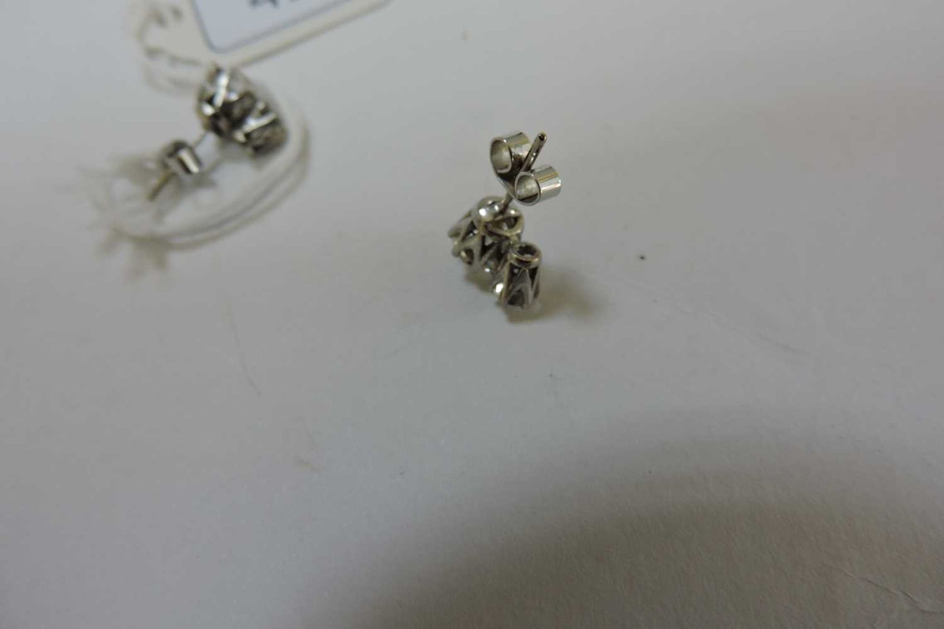 A pair of two stone diamond stud earrings, - Image 3 of 4