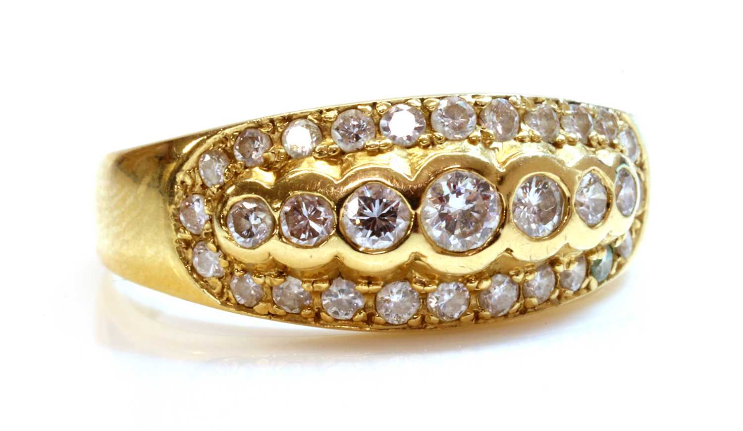 A diamond set tapered band ring,